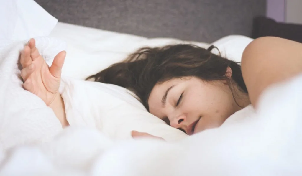 A sleeping woman having restful dreams