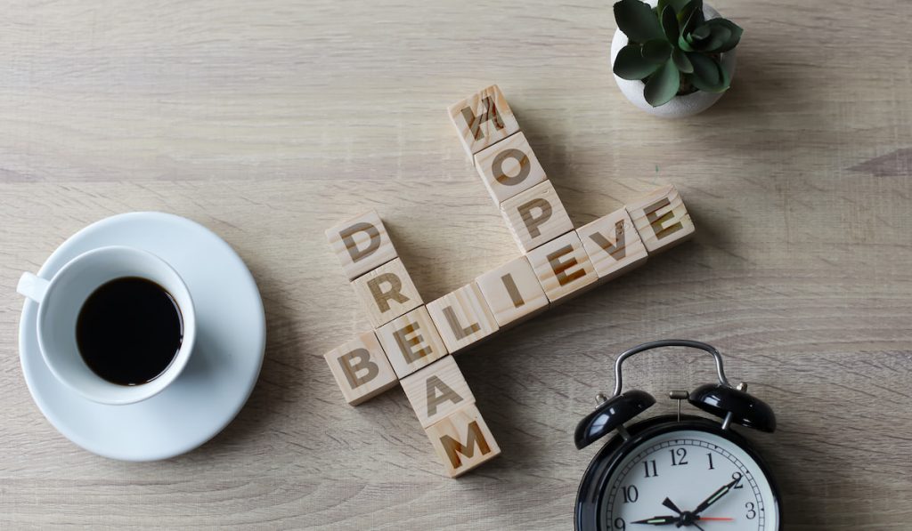 Dream Hope Believe Quot concept on wooden table