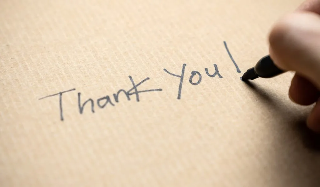 Hand writing thank you note 