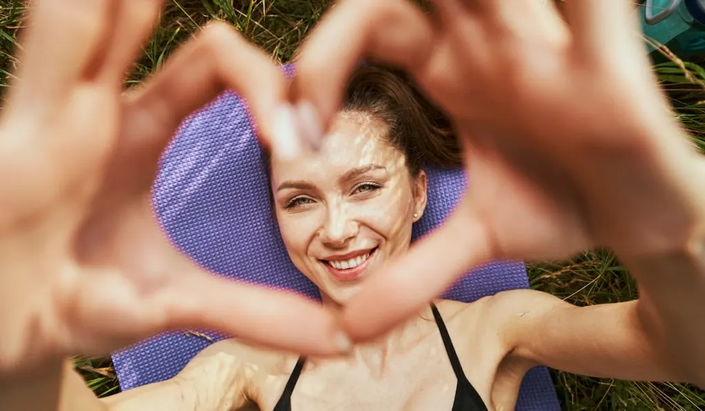 Happy woman showing her love and gratitude