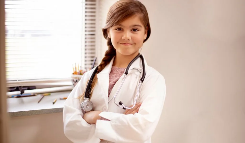 Little girl with her aspirations to one day be a doctor!