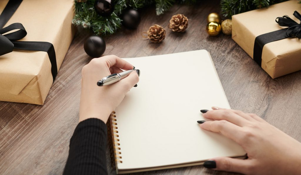 Woman Writing List of Goals