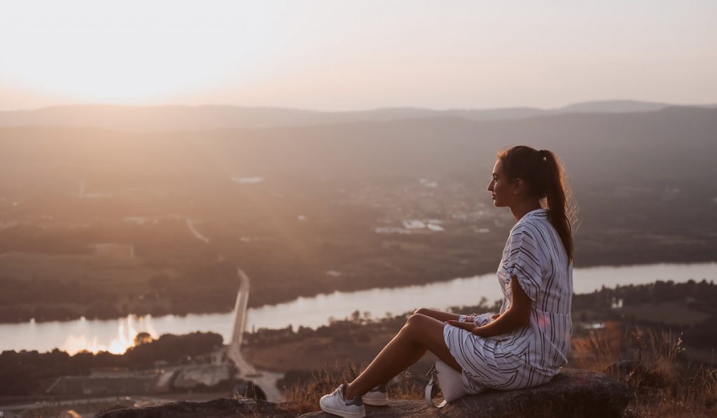 mindfulness, woman relaxing and enjoying peaceful view  