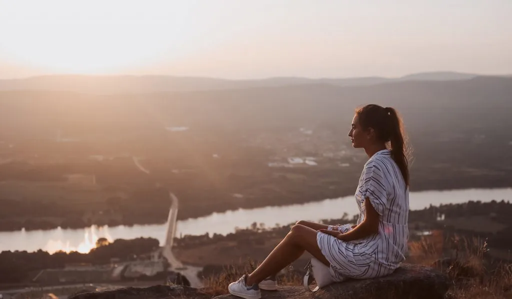 mindfulness, woman relaxing and enjoying peaceful view  