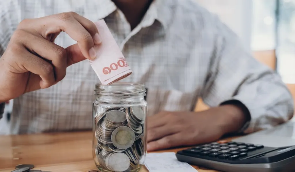 money saving concept crop photo of a man